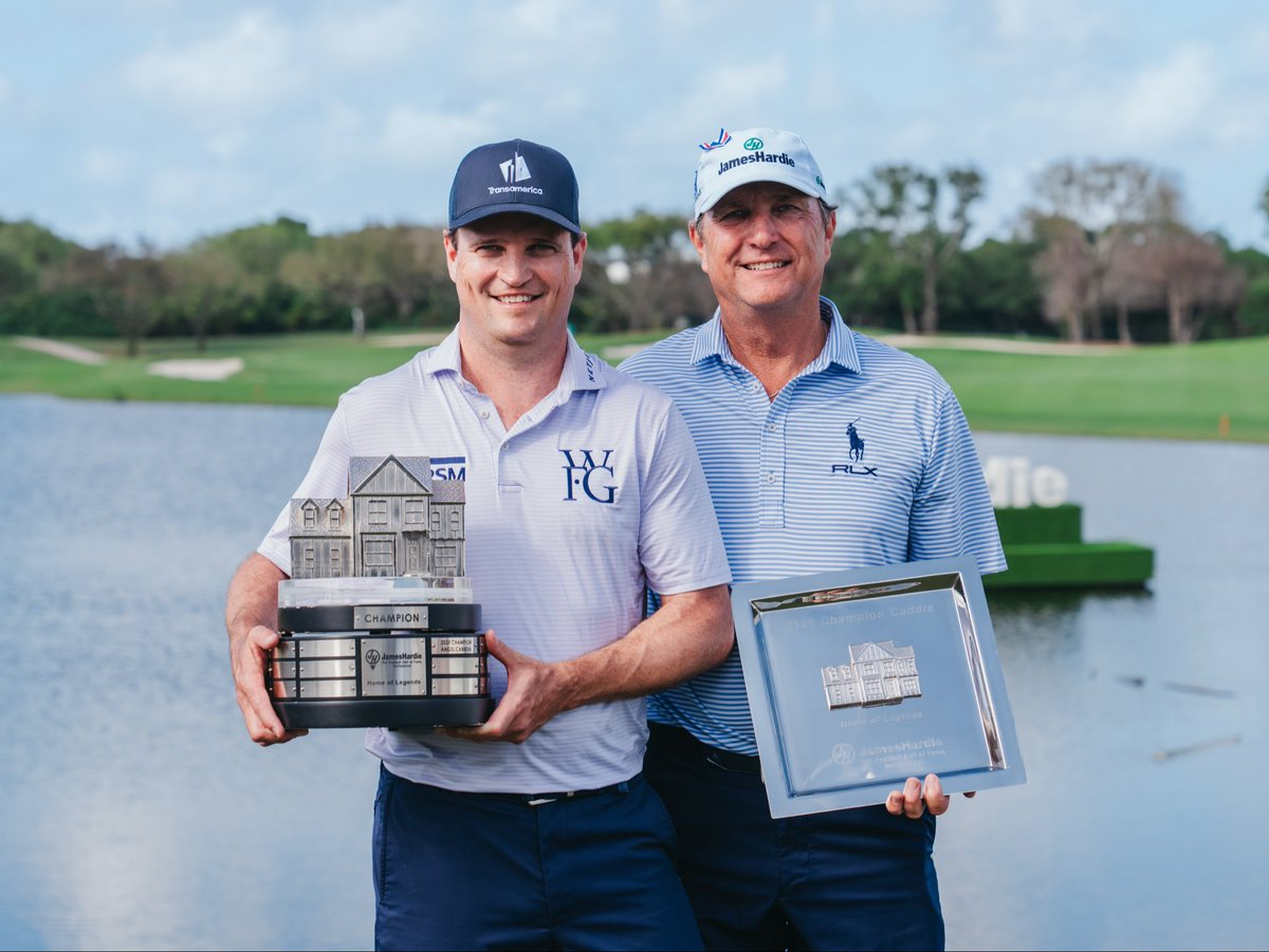The James Hardie Pro Football Hall of Fame Invitational Champion Zach Johnson and Jimbo Covert holding trophies by Malcolm DeMille